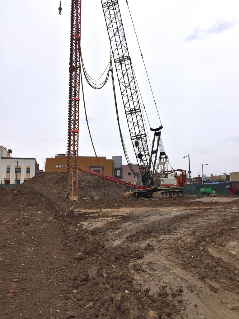 Augercast pile installation is ongoing
